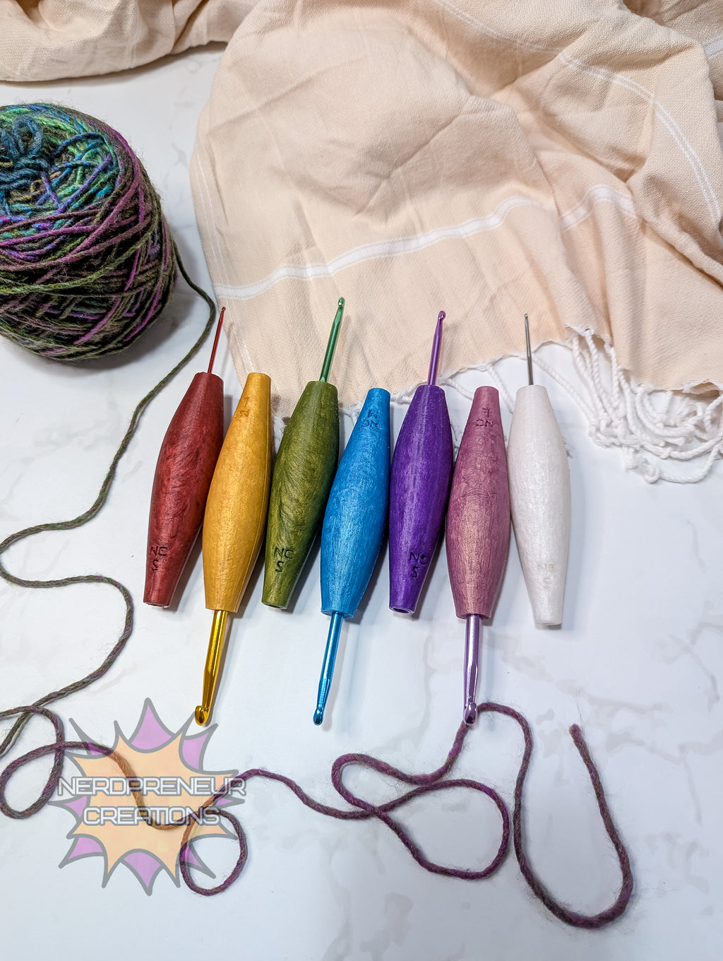 Colorful silicone crochet grip on a textured fabric background